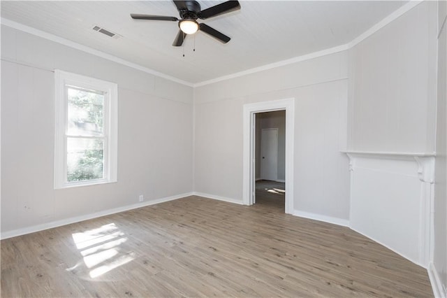 unfurnished room with crown molding, wood-type flooring, and ceiling fan