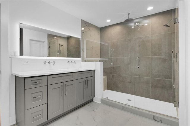 bathroom with vanity and walk in shower