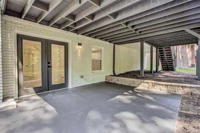 view of patio featuring french doors