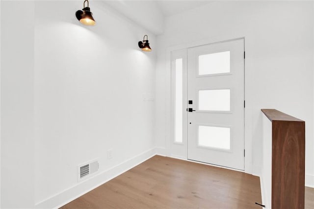 foyer featuring hardwood / wood-style flooring