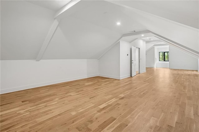 4235 Drew Campground Rd, Alpharetta, GA 30004 - bonus room featuring lofted ceiling, light wood-type flooring, and baseboards