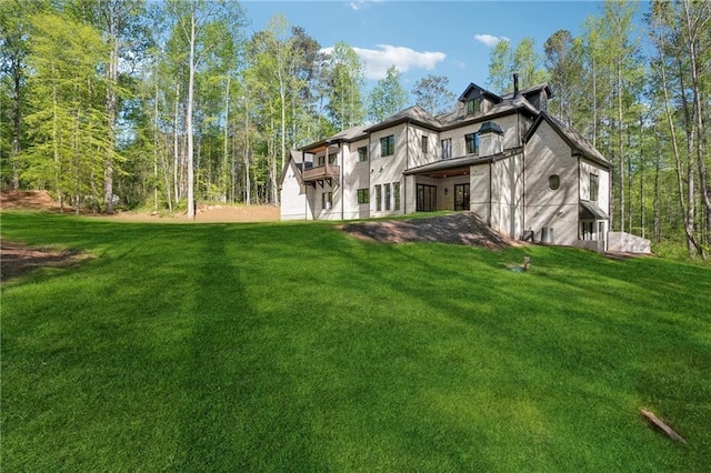 4235 Drew Campground Rd, Alpharetta, GA 30004 - back of house with a lawn and a balcony