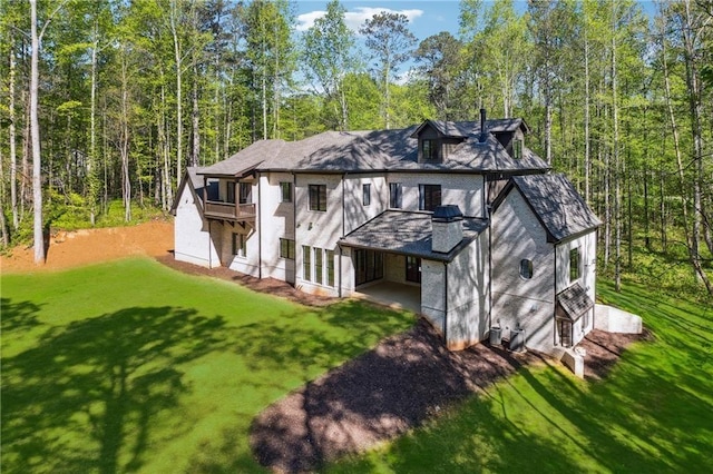 4235 Drew Campground Rd, Alpharetta, GA 30004 - back of property with a yard and a forest view