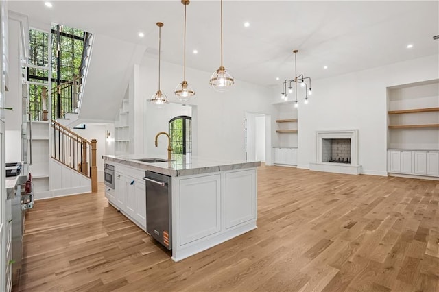 4235 Drew Campground Rd, Alpharetta, GA 30004 - kitchen featuring a sink, healthy amount of natural light, light wood-style flooring, and recessed lighting