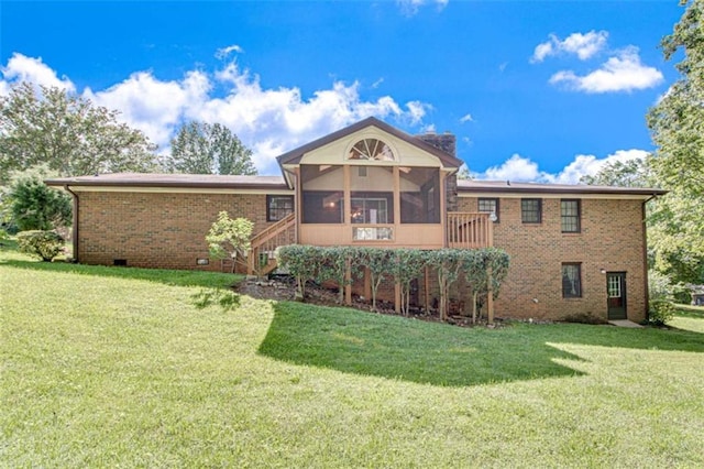 3740 Windy Hill Cir, Gainesville, GA 30504 - rear view of property with a sunroom, a lawn, and brick siding