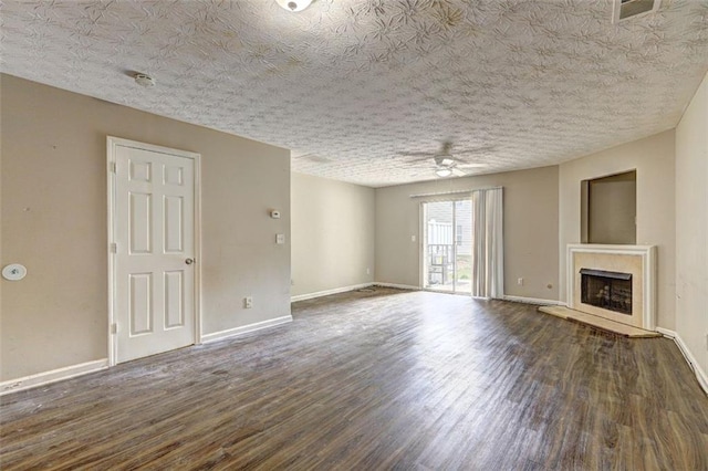 3216 Panthers Trce, Decatur, GA 30034 - unfurnished living room with visible vents, wood finished floors, a fireplace, baseboards, and a ceiling fan