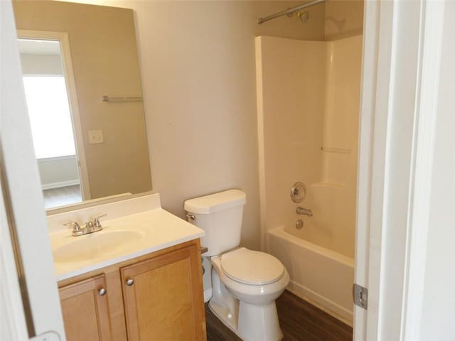 3216 Panthers Trce, Decatur, GA 30034 - bathroom featuring toilet, washtub / shower combination, wood finished floors, and vanity