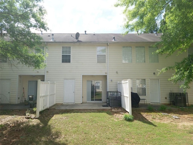 3216 Panthers Trce, Decatur, GA 30034 - back of property featuring a patio, fence, and a yard