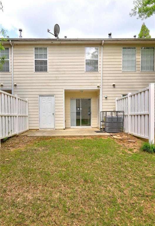 3216 Panthers Trce, Decatur, GA 30034 - back of house featuring a lawn, a patio, and a fenced backyard