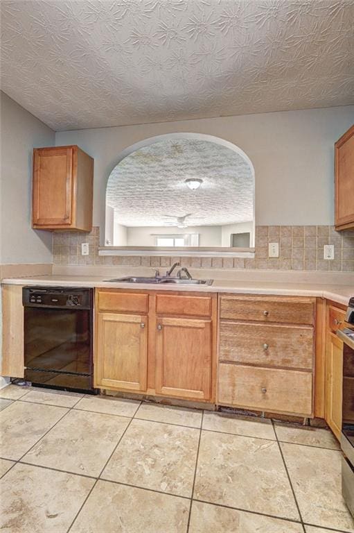 3216 Panthers Trce, Decatur, GA 30034 - kitchen with light countertops, a sink, black dishwasher, and tasteful backsplash