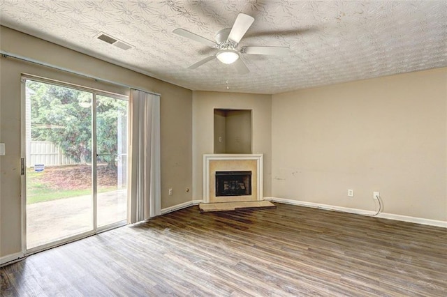 3216 Panthers Trce, Decatur, GA 30034 - unfurnished living room featuring baseboards, ceiling fan, wood finished floors, and visible vents