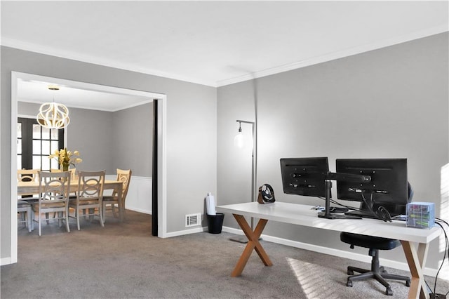 office featuring visible vents, carpet flooring, crown molding, and a notable chandelier