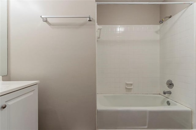 full bathroom with vanity and washtub / shower combination
