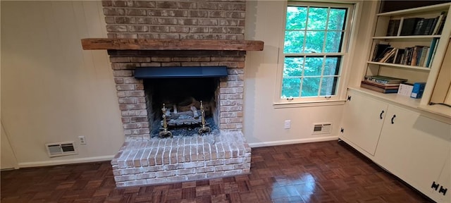2600 Amberly Dr, Dunwoody, GA 30360 - detailed view of baseboards and a brick fireplace