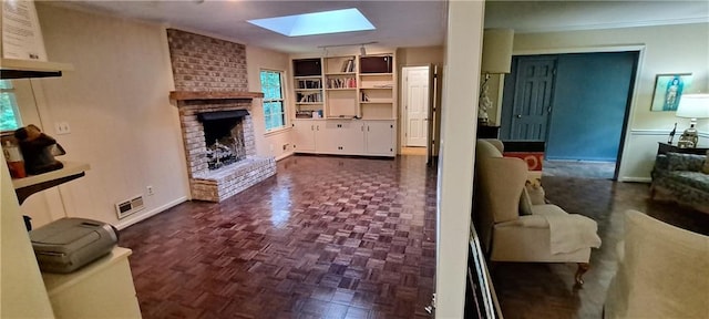 2600 Amberly Dr, Dunwoody, GA 30360 - living area with a skylight, a brick fireplace, and baseboards
