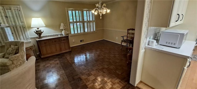 2600 Amberly Dr, Dunwoody, GA 30360 - interior space with a chandelier and baseboards