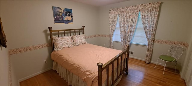 2600 Amberly Dr, Dunwoody, GA 30360 - bedroom featuring wood finished floors and baseboards