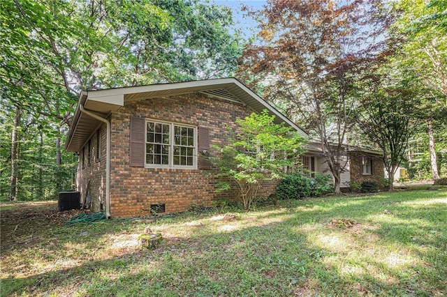 178 Garrison St, Homer, GA 30547 - view of side of home featuring brick siding and a yard