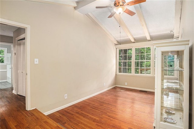 178 Garrison St, Homer, GA 30547 - empty room featuring plenty of natural light, wood finished floors, and a ceiling fan