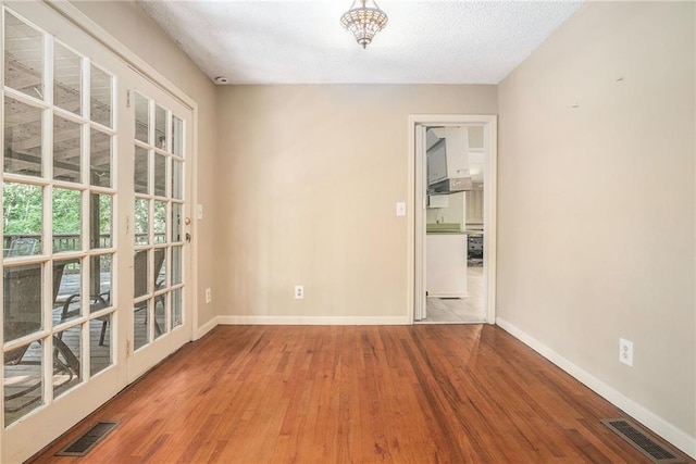 178 Garrison St, Homer, GA 30547 - unfurnished room with wood finished floors