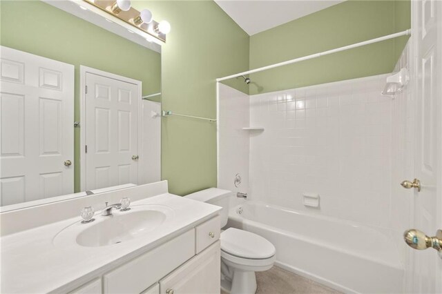 full bath featuring toilet, tub / shower combination, and vanity