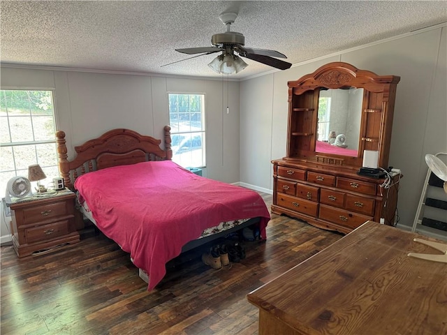 bedroom featuring multiple windows, ornamental molding, and dark hardwood / wood-style floors