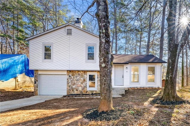 view of front of property with a garage