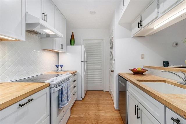 kitchen featuring sink, white cabinetry, light wood-type flooring, stainless steel dishwasher, and white range with electric stovetop