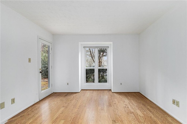 empty room featuring light wood-type flooring