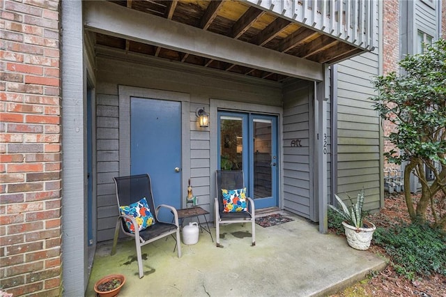 entrance to property featuring a patio