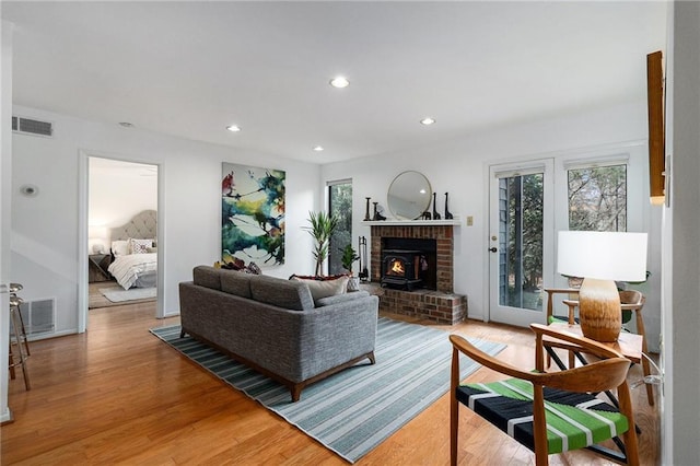 living room with light hardwood / wood-style flooring