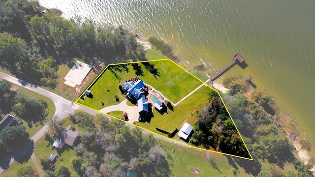 aerial view of property's location featuring a large body of water and property parcel outlined