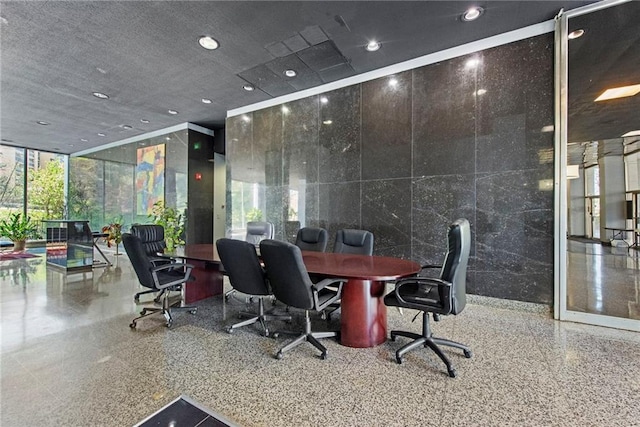 office featuring plenty of natural light and expansive windows