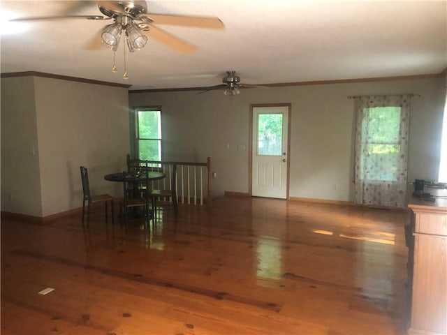4744 Chickasaw Way SE, Acworth, GA 30102 - dining room featuring crown molding, ceiling fan, and wood finished floors