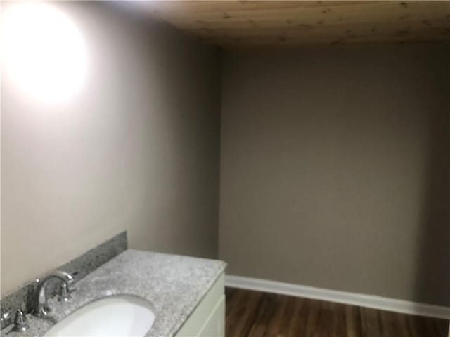 4744 Chickasaw Way SE, Acworth, GA 30102 - bathroom with vanity, wood finished floors, and wood ceiling