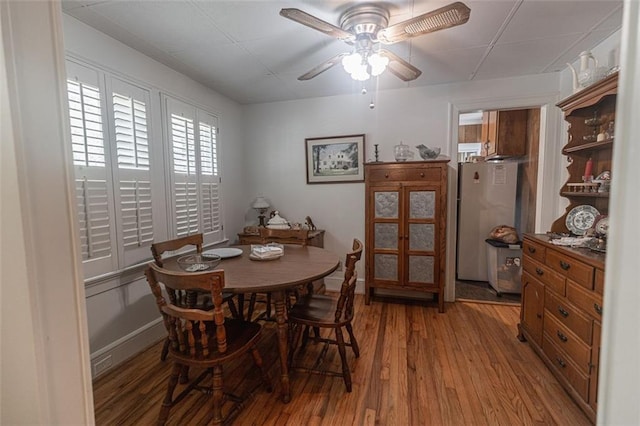 166 Etowah Dr, Cartersville, GA 30120 - dining area featuring light wood-type flooring, baseboards, and a ceiling fan