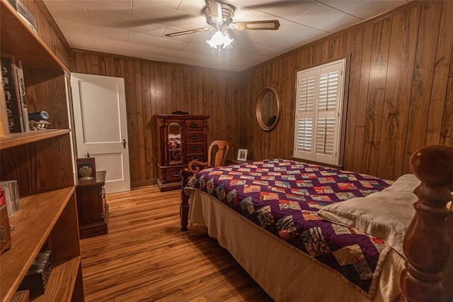 166 Etowah Dr, Cartersville, GA 30120 - bedroom with wood walls, ceiling fan, and wood finished floors