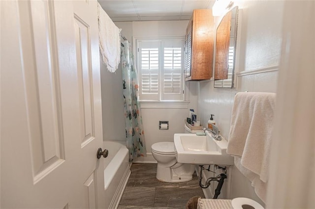 166 Etowah Dr, Cartersville, GA 30120 - full bathroom with toilet, wood finished floors, shower / bath combination with curtain, and a sink