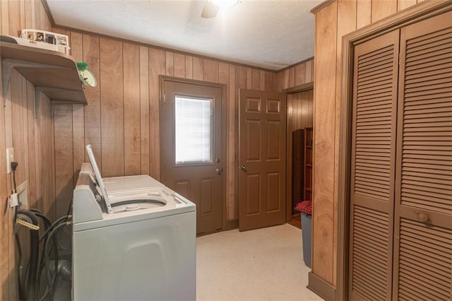 166 Etowah Dr, Cartersville, GA 30120 - clothes washing area with ornamental molding, washing machine and dryer, a textured ceiling, wood walls, and laundry area