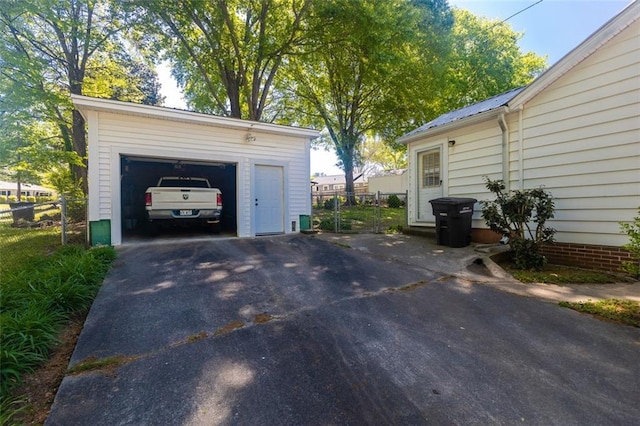 166 Etowah Dr, Cartersville, GA 30120 - detached garage with aphalt driveway and fence