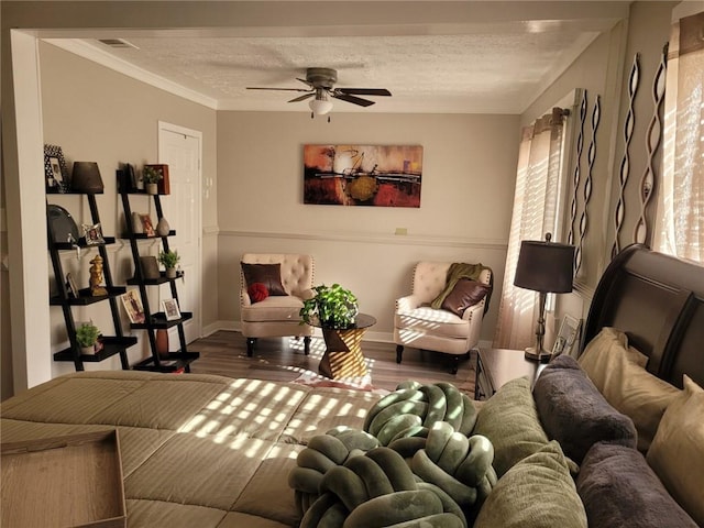 1625 Conley Rd Unit 229, Conley, GA 30288 - living room with wood finished floors, ceiling fan, a textured ceiling, and ornamental molding