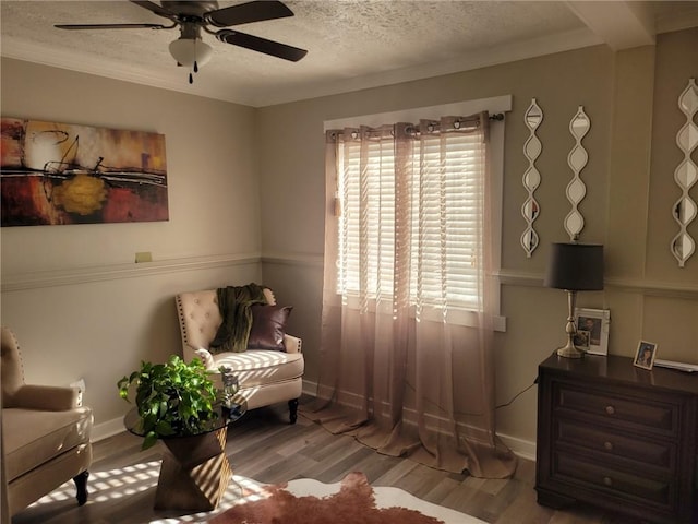 1625 Conley Rd Unit 229, Conley, GA 30288 - living area featuring wood finished floors, a textured ceiling, and a ceiling fan