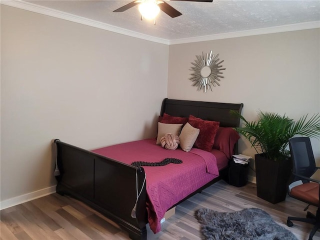 1625 Conley Rd Unit 229, Conley, GA 30288 - bedroom featuring wood finished floors, ornamental molding, and a ceiling fan