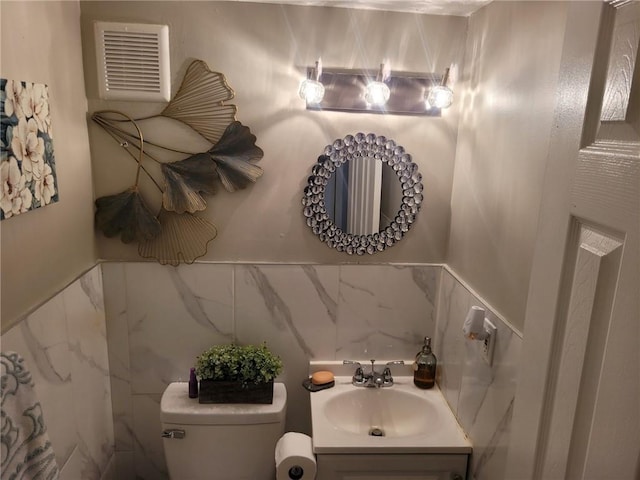 1625 Conley Rd Unit 229, Conley, GA 30288 - half bathroom with tile walls and vanity