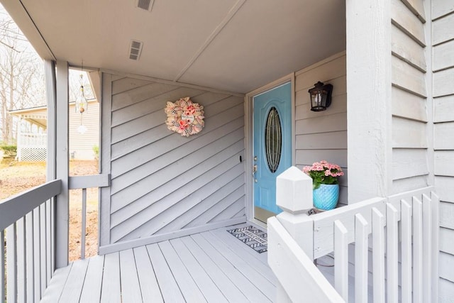 doorway to property featuring visible vents