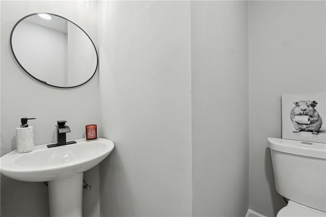 bathroom featuring toilet