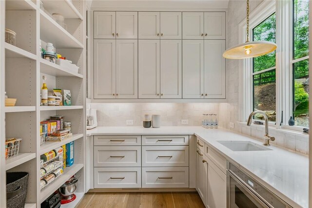 storage area featuring a sink