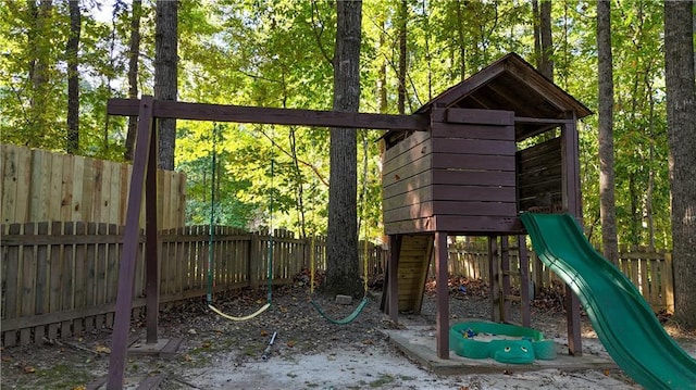 view of play area with a fenced backyard
