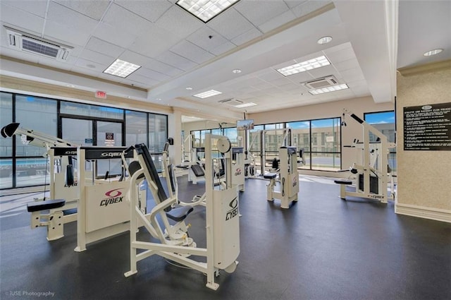 workout area with visible vents and a drop ceiling