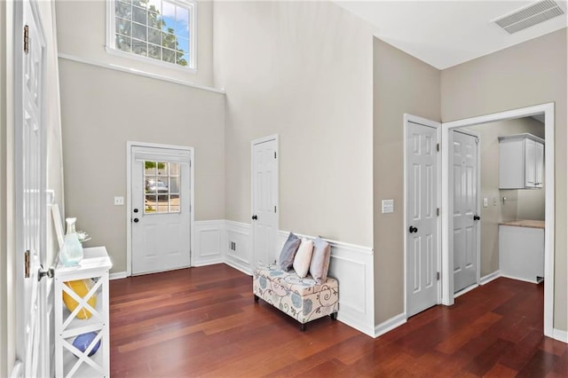 entryway featuring wood finished floors and visible vents